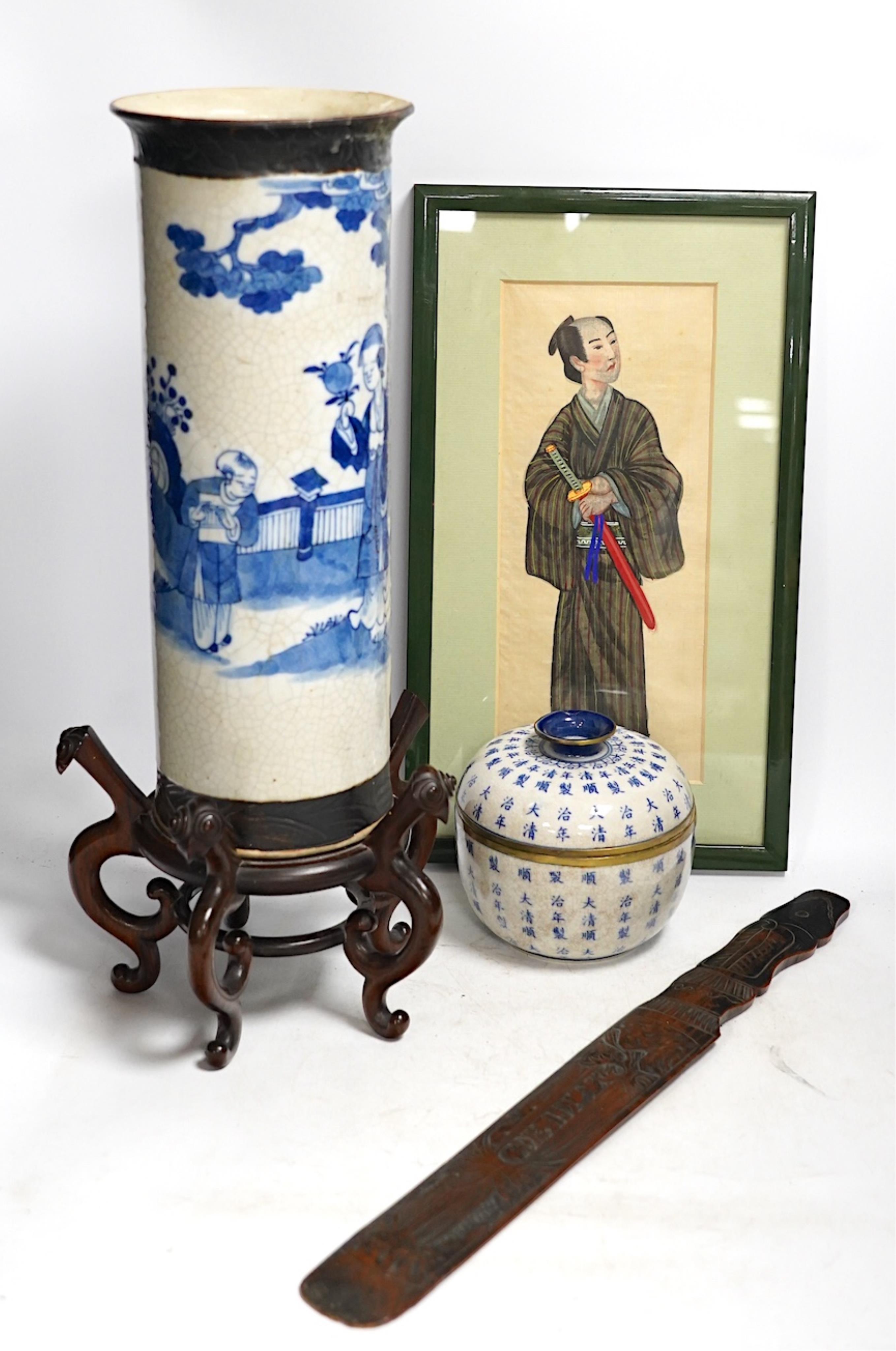 Oriental items to include a cylindrical blue and white vase with associated hardwood stand, a Japanese watercolour painting on silk together with a Japanese bamboo page turner